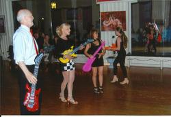 Dr. David Taber, teacher Jan, Marilou & Aislynn dancing Cha Cha at the "Dance for the Cure" 2013