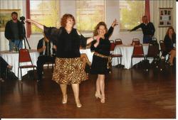 Carol dancing Cha Cha with teacher Gina at the Princess City Showcase